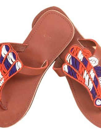 blue, red and white fur beaded flower on a brown leather